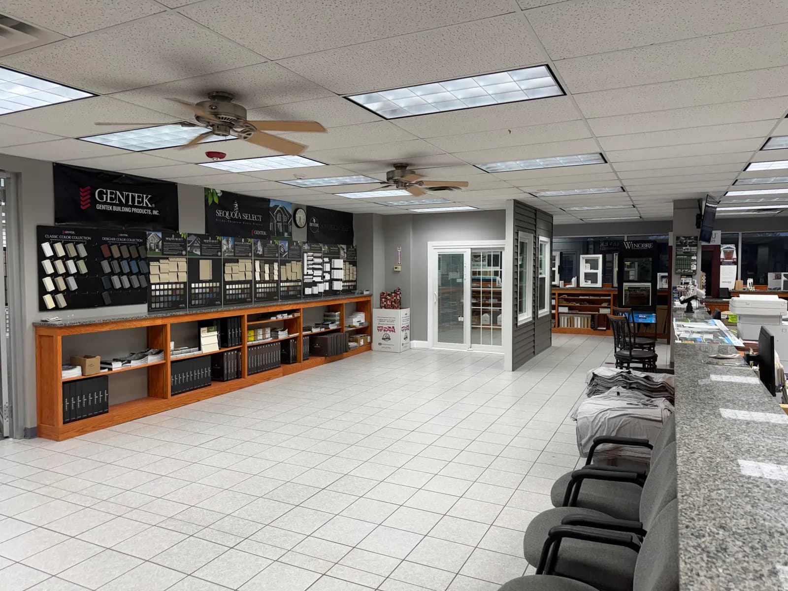 Gentek and Sequoia Select siding sample displays in the Suburban Wholesale showroom
