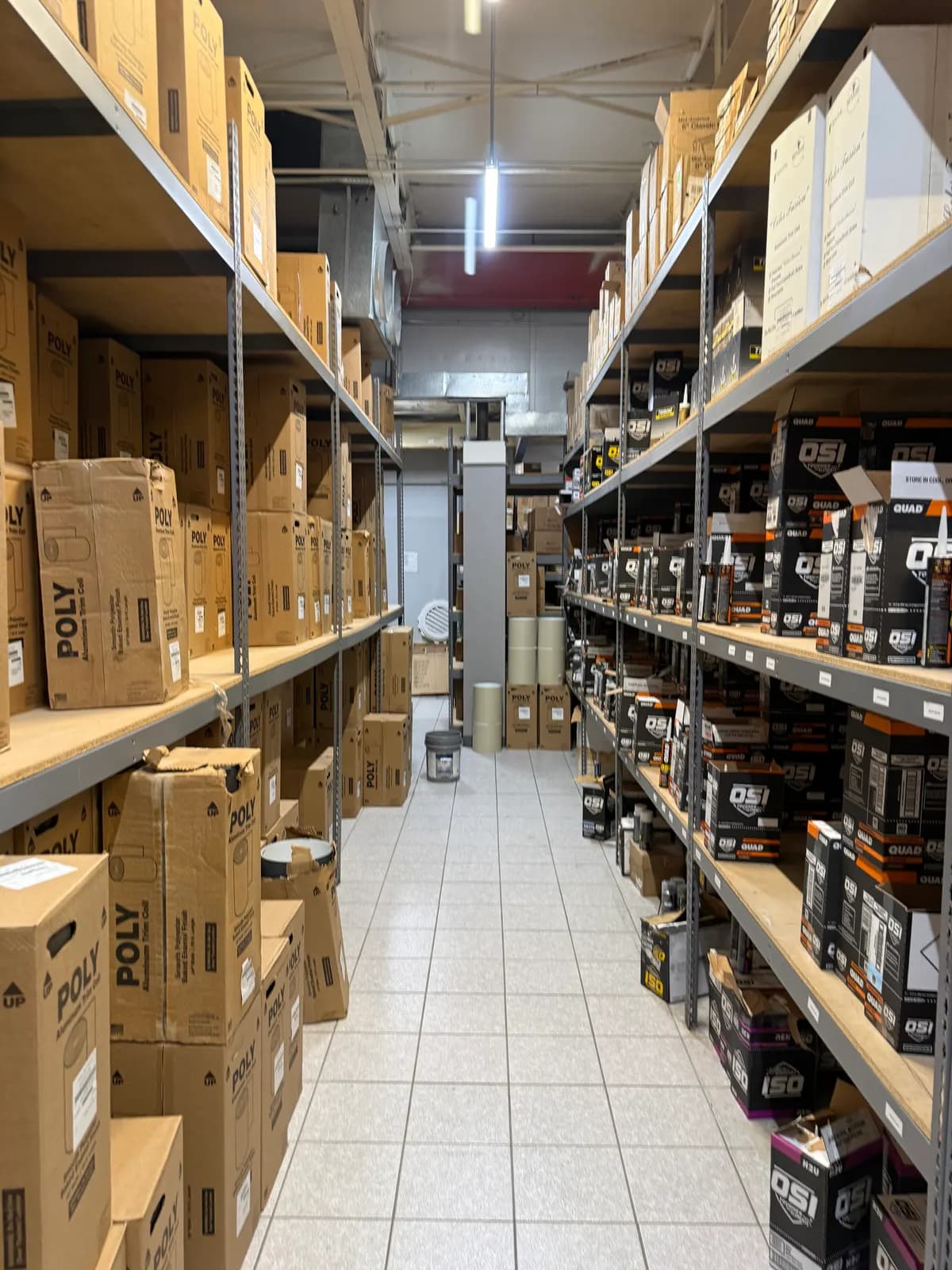 Climate-controlled warehouse aisle at Suburban Wholesale