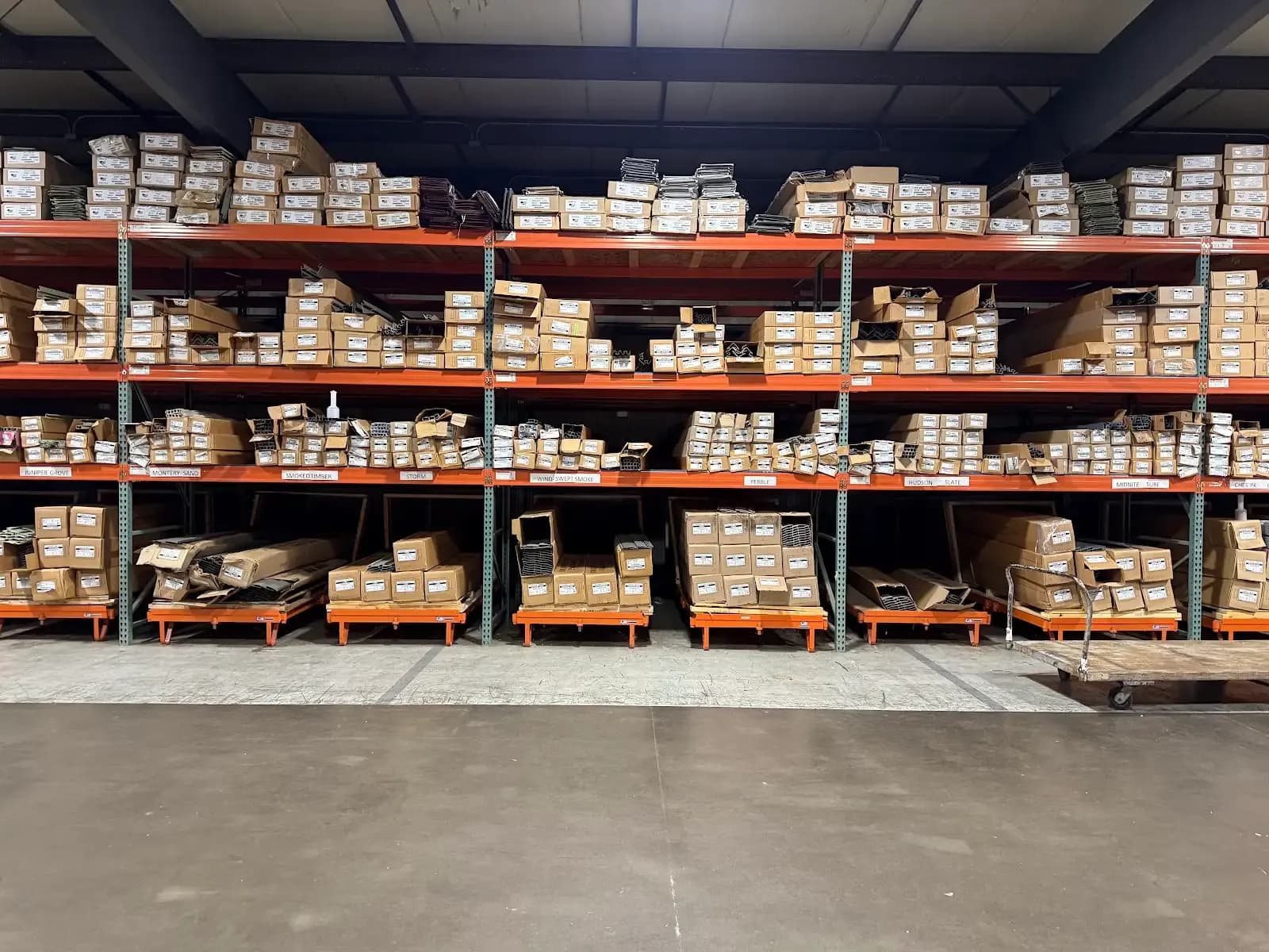 Full pallet racking of siding cartons in the Suburban Wholesale warehouse