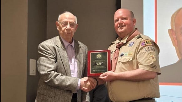 JR Girskis Presents Coach Paul Castro with Elbert K. Fretwell Educator Award
