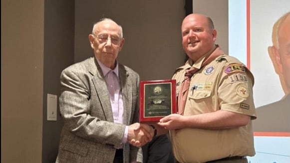JR Girskis Presents Coach Paul Castro with Elbert K. Fretwell Educator Award